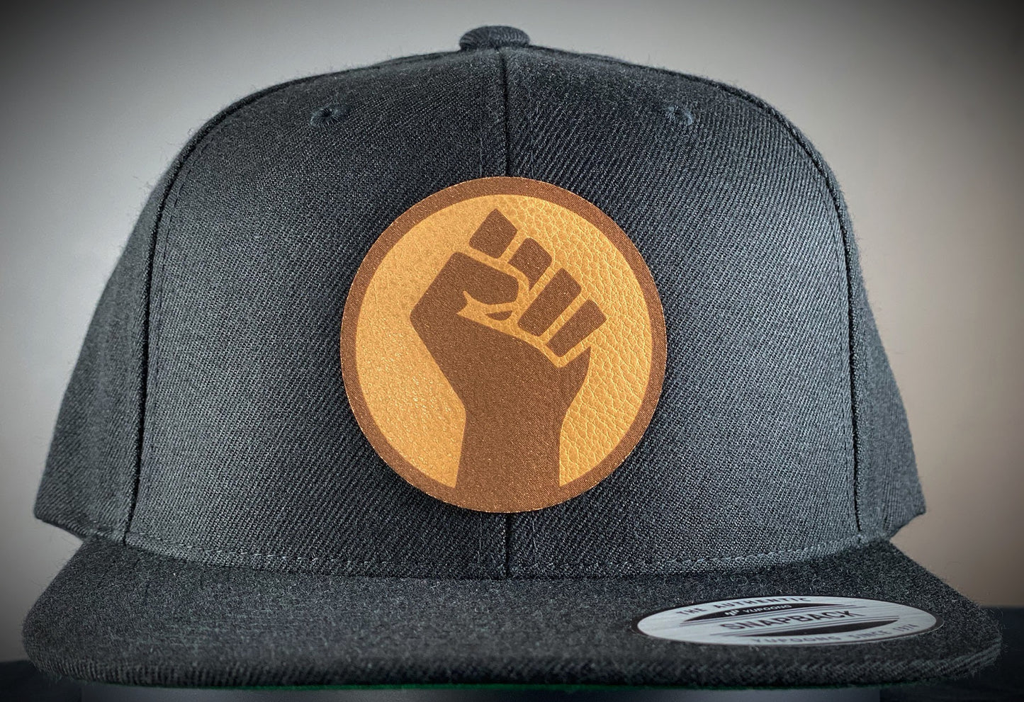 Snapback Fist (Leather Patch)